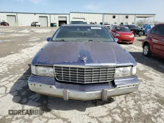 1993 Cadillac Fleetwood z VIN 1G6DW5278PR709811, wystawiony jako Copart lot #51678935 z przebiegiem 143 277 mil mil oraz Czysty tytuł • Clean title. Historia ofert i sprzedaży dostępna na DreamBid. Obrazek 5.