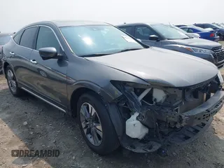 2014 Honda Crosstour EX-L z VIN 5J6TF2H59EL000957, wystawiony jako IAAI lot #42383656 z przebiegiem 116 317 mil mil oraz . Historia ofert i sprzedaży dostępna na DreamBid. Obrazek 1.
