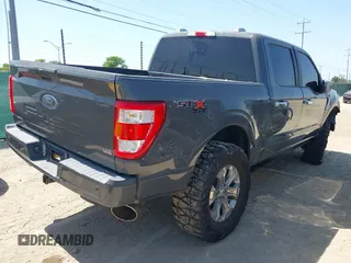 2021 Ford F-150 XL z VIN 1FTFW1E59MFA21578, wystawiony jako IAAI lot #42007968 z przebiegiem 74 025 mil mil oraz . Historia ofert i sprzedaży dostępna na DreamBid. Obrazek 4.