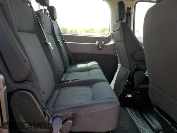 2021 Ford Transit Passenger XL z VIN 1FBAX2Y88MKA30996, wystawiony jako Copart lot #52709324 z przebiegiem 86 753 mil mil oraz Szkoda całkowita • Salvage title. Historia ofert i sprzedaży dostępna na DreamBid. Obrazek 11.