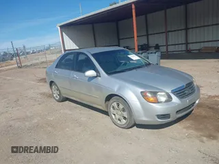 2009 Kia Spectra EX with VIN KNAFE221995647605, listed as a IAAI auction lot 41680420 with 169,000 mi miles. Bid and sale history available at carsss.com. Image 1.