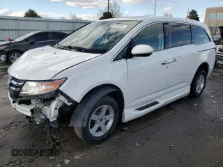 2014 Honda Odyssey Touring with VIN 5FNRL5H99EB031951, listed as a Copart auction lot 45761165 with 82,101 mi miles and Salvage Title. Bid and sale history available at carsss.com. Image 1.