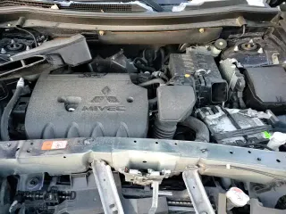 2017 Mitsubishi Outlander ES z VIN JA4AD2A30HZ051822, wystawiony jako Copart lot #85850924 z przebiegiem 97 453 mil mil oraz Szkoda całkowita • Salvage title. Historia ofert i sprzedaży dostępna na DreamBid. Obrazek 14.
