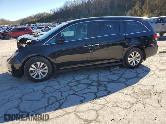 2014 Honda Odyssey EX-L with VIN 5FNRL5H69EB121140, listed as a Copart auction lot 79698724 with 169,626 mi miles and Salvage Title. Bid and sale history available at DreamBid. Image 1.