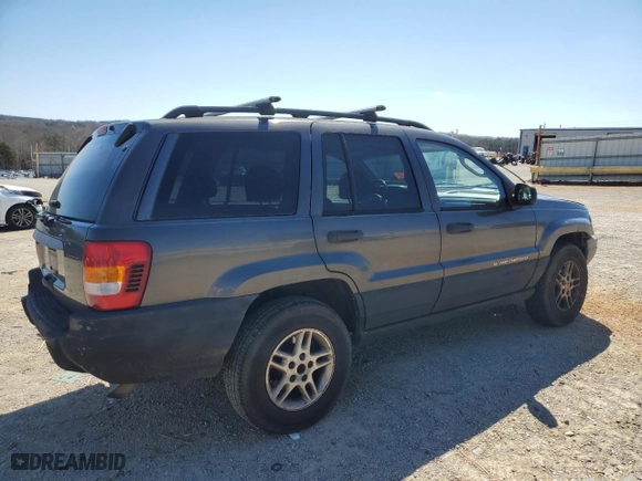 2002 Jeep Grand Cherokee Laredo with VIN 1J4GW48S62C307775, listed as a Copart auction lot 50773355 with 269,110 mi miles and Salvage Title. Bid and sale history available at carsss.com. Image 3.