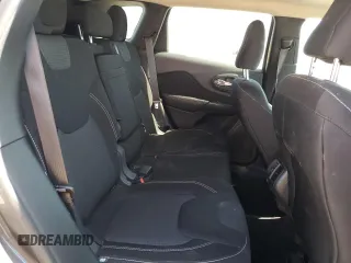 2015 Jeep Cherokee Latitude z VIN 1C4PJMCB2FW734385, wystawiony jako Copart lot #57333805 z przebiegiem 121 249 mil mil oraz Szkoda całkowita • Salvage title. Historia ofert i sprzedaży dostępna na DreamBid. Obrazek 11.