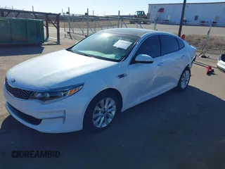 2016 Kia Optima EX with VIN 5XXGU4L32GG032974, listed as a IAAI auction lot 41881338 with 118,590 mi miles. Bid and sale history available at carsss.com. Image 18.