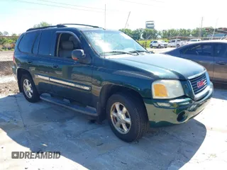 2003 GMC Envoy SLT with VIN 1GKDS13S332168758, listed as a IAAI auction lot 41894372 with 195,353 mi miles. Bid and sale history available at carsss.com. Image 1.