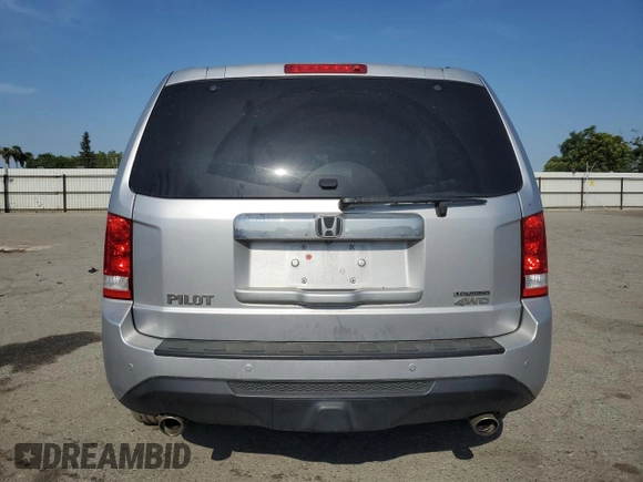 2014 Honda Pilot Touring z VIN 5FNYF4H97EB055677, wystawiony jako Copart lot #55132895 z przebiegiem 83 030 mil mil oraz Szkoda całkowita • Salvage title. Historia ofert i sprzedaży dostępna na DreamBid. Obrazek 6.