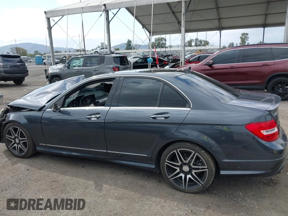 2014 Mercedes-Benz C C 250 Sport with VIN WDDGF4HB6ER317333, listed as a IAAI auction lot 42127437 with 128,010 mi miles. Bid and sale history available at carsss.com. Image 15.