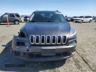 2014 Jeep Cherokee Latitude with VIN 1C4PJLCB2EW245753, listed as a Copart auction lot 49452985 with 106,240 mi miles and Salvage Title. Bid and sale history available at carsss.com. Image 5.
