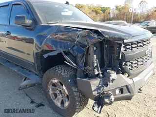 2017 Chevrolet Silverado 1500 LT with VIN 1GCVKREC0HZ293560, listed as a IAAI auction lot 40706331 with 133,438 mi miles. Bid and sale history available at carsss.com. Image 6.