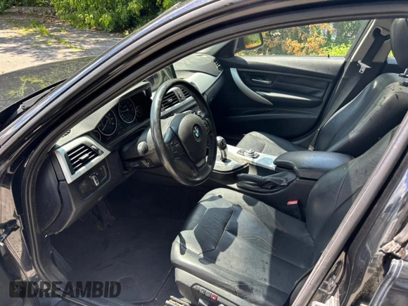 2013 BMW 3 Series 328i xDrive with VIN WBA3B5G57DNS00448, listed as a Copart auction lot 63165005 with 190,464 mi miles and Clean title. Bid and sale history available at DreamBid. Image 5.