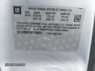 2014 Chevrolet Impala LT with VIN 2G1WB5E31E1184020, listed as a IAAI auction lot 41770355 with 135,367 mi miles and . Bid and sale history available at DreamBid. Image 9.