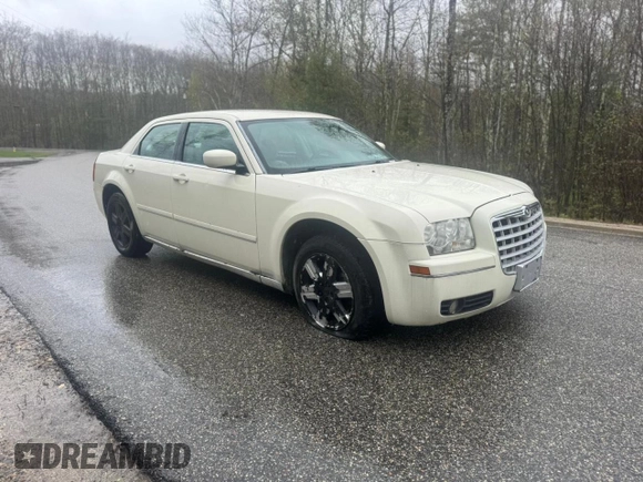 2005 Chrysler 300 Touring AWD with VIN 2C3JK53G05H695222, listed as a Copart auction lot 56255795 with Not Provided miles and Clean Title. Bid and sale history available at DreamBid. Image 1.