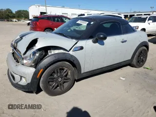2014 MINI Coupe S z VIN WMWSX3C57ET409158, wystawiony jako Copart lot #81650034 z przebiegiem 118 523 mil mil oraz Szkody całkowita. Historia ofert i sprzedaży dostępna na DreamBid. Obrazek 1.