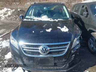 2011 Volkswagen Tiguan SE with VIN WVGBV7AXXBW511550, listed as a IAAI auction lot 41630804 with 99,967 mi miles and . Bid and sale history available at DreamBid. Image 12.