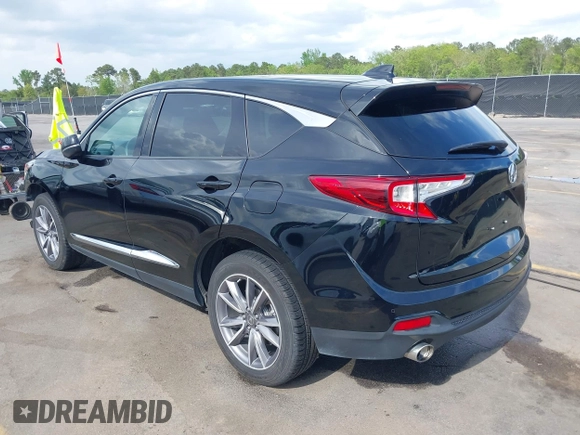 2020 Acura RDX w/Technology Pkg with VIN 5J8TC1H57LL002097, listed as a IAAI auction lot 41957752 with 60,945 mi miles. Bid and sale history available at carsss.com. Image 3.