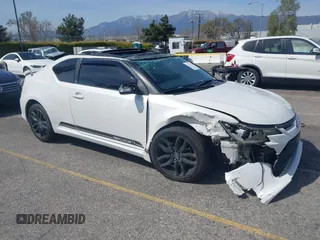 2015 Scion tC with VIN JTKJF5C71F3095189, listed as a IAAI auction lot 41847417 with 129,164 mi miles. Bid and sale history available at carsss.com. Image 1.
