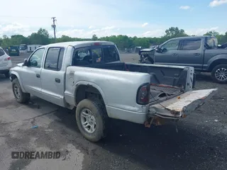 2004 Dodge Dakota Sport with VIN 1D7HG38N24S707004, listed as a IAAI auction lot 42201115 with 195,896 mi miles and . Bid and sale history available at carsss.com. Image 3.