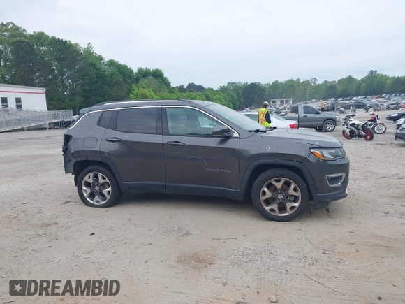 2020 Jeep Compass Limited with VIN 3C4NJCCB0LT128635, listed as a IAAI auction lot 42085121 with 166,511 mi miles and . Bid and sale history available at DreamBid. Image 14.