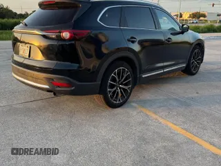 2017 Mazda CX-9 Signature z VIN JM3TCBEY8H0138807, wystawiony jako Copart lot #65293795 z przebiegiem 78 585 mil mil oraz Czysty tytuł • Clean title. Historia ofert i sprzedaży dostępna na DreamBid. Obrazek 4.
