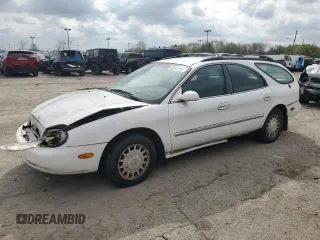 1999 Mercury Sable z VIN 1MEFM58U7XA652331, wystawiony jako Copart lot #49919194 z przebiegiem 143 835 mil mil oraz Szkody całkowita. Historia ofert i sprzedaży dostępna na DreamBid. Obrazek 1.