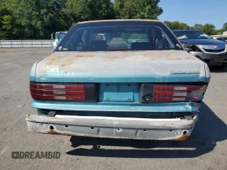 1992 Plymouth Sundance z VIN 1P3XP24D7NN120553, wystawiony jako Copart lot #68472794 z przebiegiem 148 535 mil mil oraz Szkody całkowita. Historia ofert i sprzedaży dostępna na DreamBid. Obrazek 6.