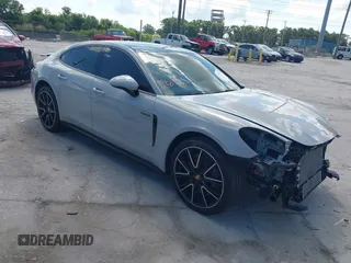 2018 Porsche Panamera 4 E-Hybrid z VIN WP0AE2A7XJL174378, wystawiony jako IAAI lot #42303125 z przebiegiem 35 636 mil mil oraz . Historia ofert i sprzedaży dostępna na DreamBid. Obrazek 1.