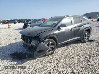 2023 Hyundai Tucson SEL z VIN 5NMJFCAE0PH232705, wystawiony jako Copart lot #50071795 z przebiegiem 13 827 mil mil oraz Szkoda całkowita • Salvage title. Historia ofert i sprzedaży dostępna na DreamBid. Obrazek 1.