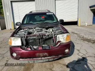 2003 GMC Envoy SLT z VIN 1GKET16S136186780, wystawiony jako Copart lot #55927155 z przebiegiem 163 099 mil mil oraz Szkoda całkowita • Salvage title. Historia ofert i sprzedaży dostępna na DreamBid. Obrazek 14.