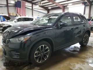 2016 Mazda CX-5 Grand Touring with VIN JM3KE4DY2G0738899, listed as a Copart auction lot 50943255 with 80,807 mi miles and Salvage Title. Bid and sale history available at carsss.com. Image 1.