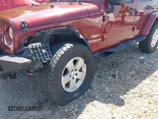 2007 Jeep Wrangler Unlimited Sahara with VIN 1J4GA59187L116585, listed as a IAAI auction lot 41996297 with 151,961 mi miles and . Bid and sale history available at DreamBid. Image 6.