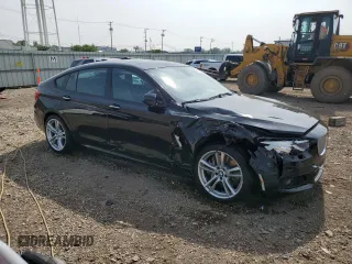 2012 BMW 5 Series 550i Gran Turismo with VIN WBASN4C5XCC210209, listed as a Copart auction lot 60665625 with 97,078 mi miles and Salvage title. Bid and sale history available at DreamBid. Image 4.