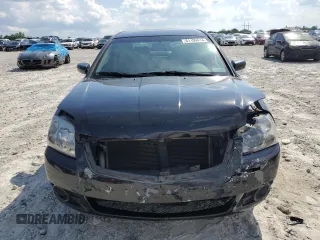 2012 Mitsubishi Galant FE z VIN 4A32B2FF2CE020409, wystawiony jako Copart lot #61199414 z przebiegiem 227 549 mil mil oraz Szkoda całkowita • Salvage title. Historia ofert i sprzedaży dostępna na DreamBid. Obrazek 5.