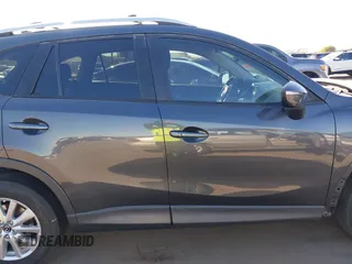 2016 Mazda CX-5 Touring with VIN JM3KE2CY4G0695947, listed as a IAAI auction lot 41824490 with 162,191 mi miles and . Bid and sale history available at carsss.com. Image 14.