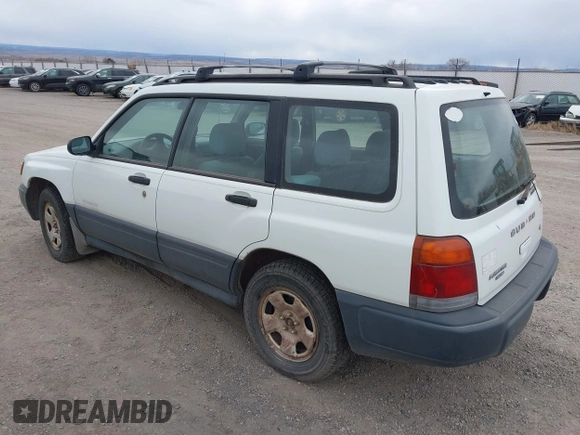1998 Subaru Forester L with VIN JF1SF635XWH753021, listed as a IAAI auction lot 41541975 with 236,425 mi miles. Bid and sale history available at carsss.com. Image 3.