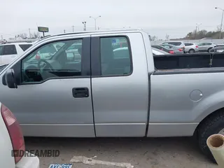 2007 Ford F-150 STX with VIN 1FTRX12W27FA79916, listed as a IAAI auction lot 41581837 with 209,945 mi miles and . Bid and sale history available at DreamBid. Image 14.