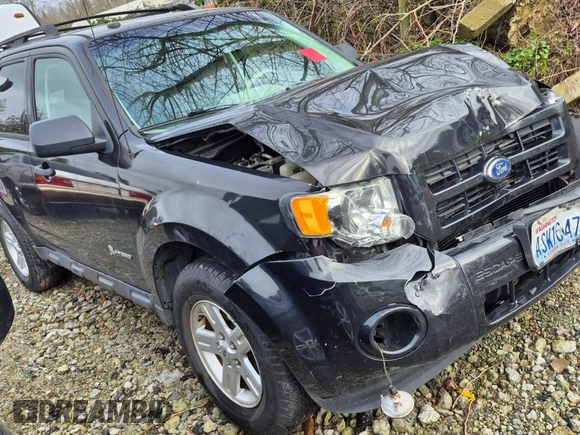2011 Ford Escape Hybrid с VIN 1FMCU5K36BKB54964, выставлен на аукционе Copart как лот 82873554 с пробегом Не указан миль и Списание • Salvage title. История ставок и продаж доступна на DreamBid. Изображение 4.