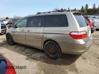 2007 Honda Odyssey EX-L with VIN 5FNRL38627B513688, listed as a Copart auction lot 52483475 with 321,974 mi miles and Clean Title. Bid and sale history available at carsss.com. Image 2.