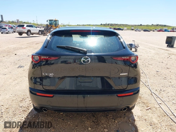 2023 Mazda CX-30 S with VIN 3MVDMBAM8PM548451, listed as a IAAI auction lot 41972170 with 36,379 mi miles and . Bid and sale history available at carsss.com. Image 16.