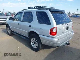 2002 Isuzu Rodeo S with VIN 4S2CK58W024342335, listed as a IAAI auction lot 42595434 with 144,529 mi miles and . Bid and sale history available at DreamBid. Image 3.