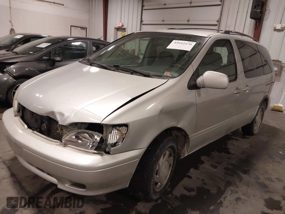2003 Toyota Sienna LE with VIN 4T3ZF13C53U510457, listed as a IAAI auction lot 41642470 with 219,515 mi miles. Bid and sale history available at carsss.com. Image 2.