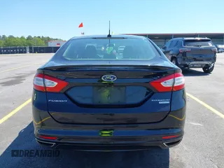 2016 Ford Fusion Titanium with VIN 3FA6P0K9XGR158234, listed as a IAAI auction lot 42043716 with 161,164 mi miles. Bid and sale history available at carsss.com. Image 16.