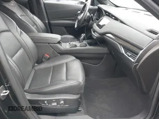 2019 Cadillac XT4 FWD Sport z VIN 1GYFZER49KF178096, wystawiony jako IAAI lot #41611247 z przebiegiem 37 971 mil mil oraz . Historia ofert i sprzedaży dostępna na DreamBid. Obrazek 5.