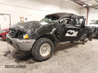 2001 Ford Ranger XL with VIN 1FTYR14U41TA01826, listed as a IAAI auction lot 41118358 with 195,467 mi miles. Bid and sale history available at carsss.com. Image 2.