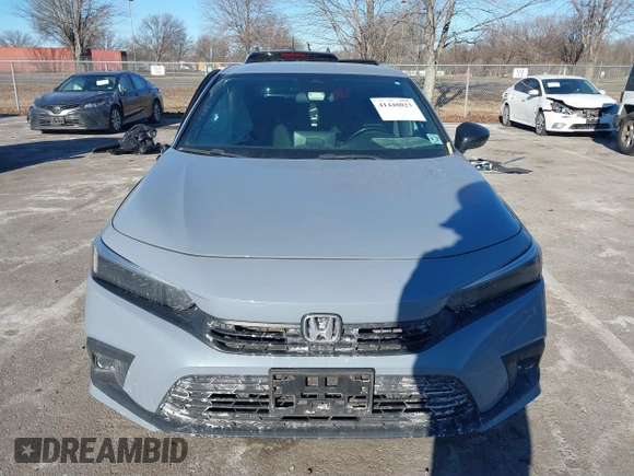 2022 Honda Civic Sport with VIN 2HGFE2F58NH577499, listed as a IAAI auction lot 41448023 with 44,001 mi miles and . Bid and sale history available at carsss.com. Image 12.