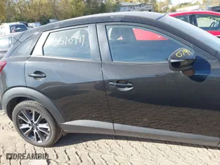 2018 Mazda CX-3 Touring with VIN JM1DKFC75J1302046, listed as a IAAI auction lot 40570799 with 62,554 mi miles. Bid and sale history available at carsss.com. Image 13.