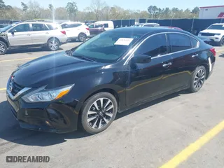 2018 Nissan Altima 2.5 SR with VIN 1N4AL3AP6JC267562, listed as a IAAI auction lot 41826041 with 122,229 mi miles. Bid and sale history available at carsss.com. Image 17.