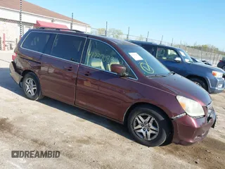 2007 Honda Odyssey EX-L z VIN 5FNRL38757B407969, wystawiony jako IAAI lot #42237083 z przebiegiem 188 249 mil mil oraz . Historia ofert i sprzedaży dostępna na DreamBid. Obrazek 1.